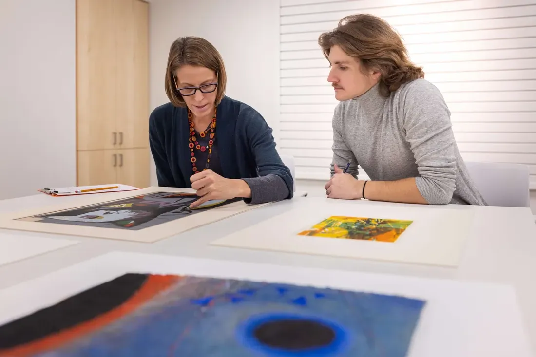 Professor Sascha Scott during museum review with a student.