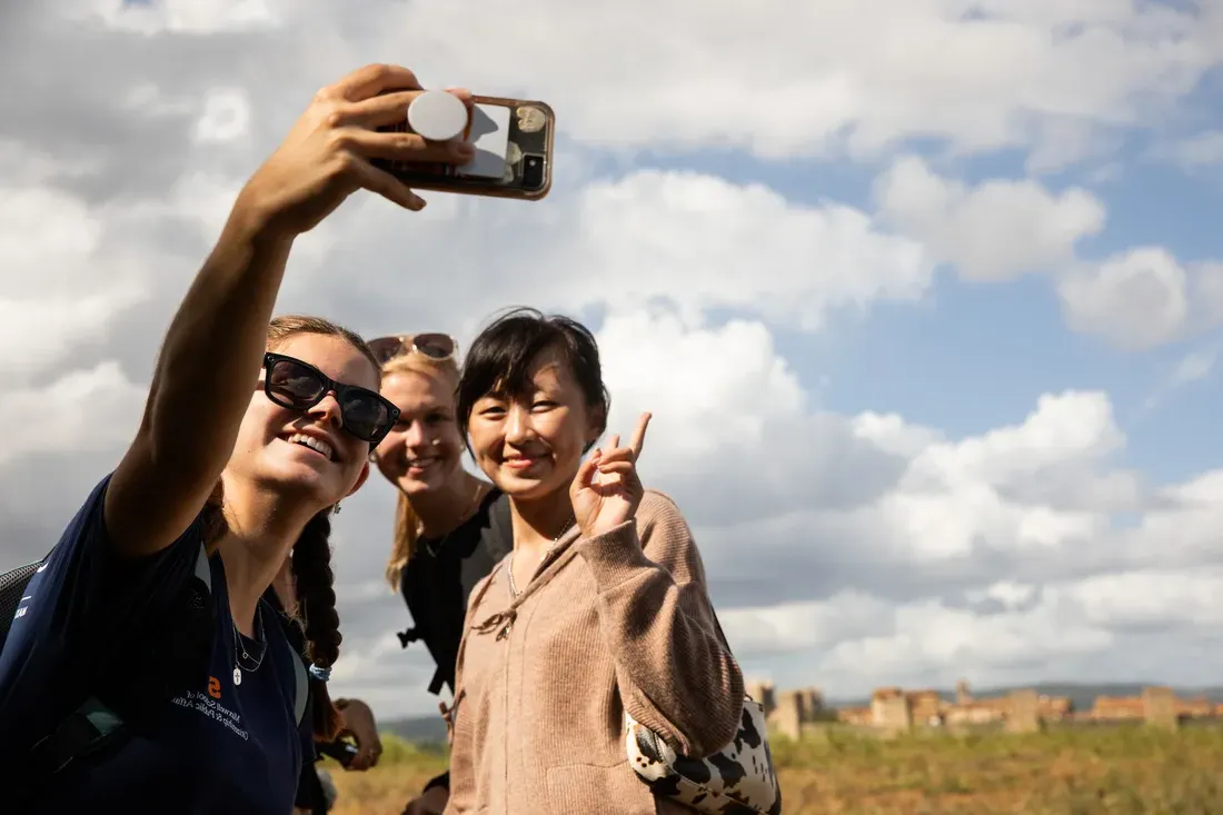 People taking a selfie.